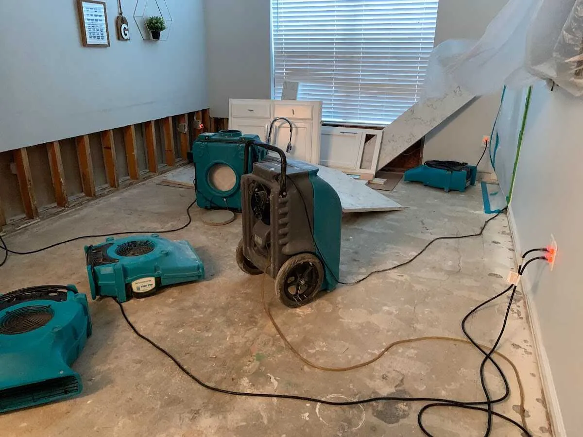 Dehumidifier in flood-cut room for Water Damage Restoration in Snellville